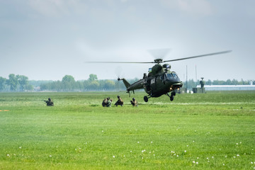 Fototapeta na wymiar Military operation with the use of helicopters