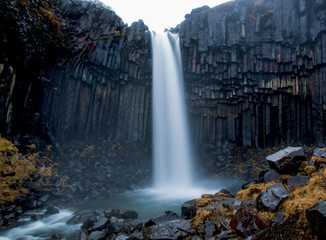 Fototapeta na wymiar Svartifoss waterfall surrounded by basalt columns