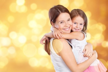 Happy Mother and daughter hugging