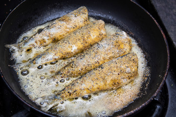 barbecued prawns in a griddle pan cooked with lemon and garlic