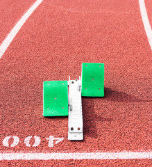 Starting blocks at the 400 meter start