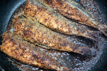 barbecued prawns in a griddle pan cooked with lemon and garlic