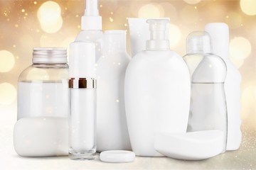 Fototapeta na wymiar Cosmetic white Bottles and spa products on background