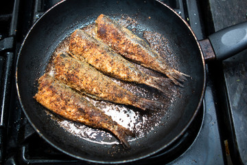 barbecued prawns in a griddle pan cooked with lemon and garlic
