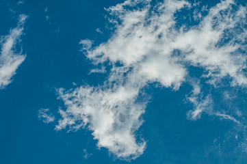 Blue sky with white clouds. Sky background.