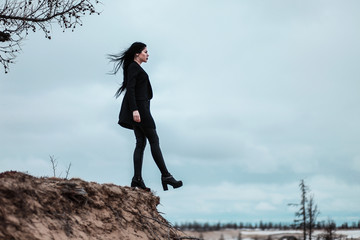 Woman making a step into emptiness