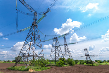 powerline in direct sunlight / bright day the landscape in backlighting