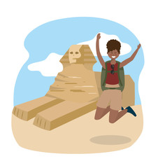 woman jumping with backpack to egypt sculpture adventure