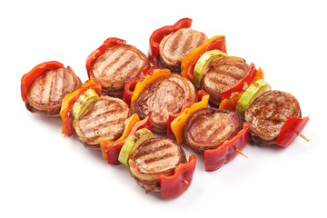 BBQ grilled Pork medallions wrapped in bacon, close-up, isolated on white background