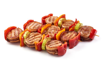 Grilled meat fillet steaks wrapped in bacon, pork medallions, close-up, isolated on white background