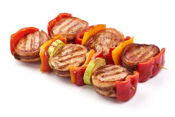 Grilled Meat medallions wrapped in bacon, close-up, isolated on white background