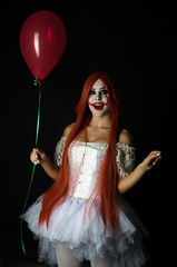 girl dressed as a scary clown