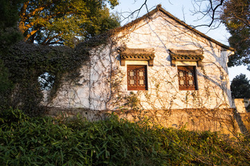 Ancient village house with white walls in the Tiger Hill park in China, Suzhou