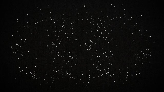 Digital composite of moving particles