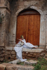Dancers performing ancient Greek dances near the Acropolis of Athens. Greece, October 2019. 