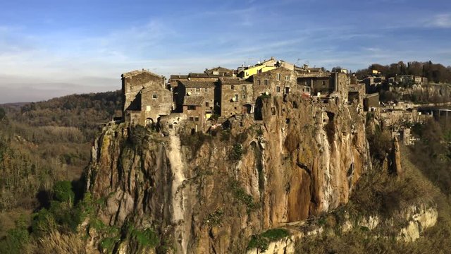 Aerial shot of comune and town of Calcata on high rock, Italy