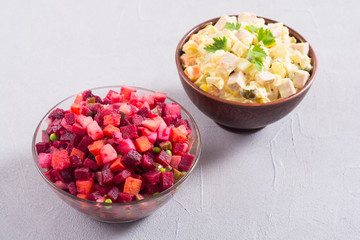 Traditional Russian salad olivier andvinaigrette