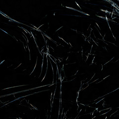 Transparent plastic wrap on the black background. Plastic bag texture. Reusable trash and waste.