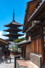 View of Yasaka-dori area with Hokanji temple (Yasaka Pagoda), near Sannen-zaka and Ninen-zaka Slopes. Here is the most photogenic landmark in Kyoto, Japan