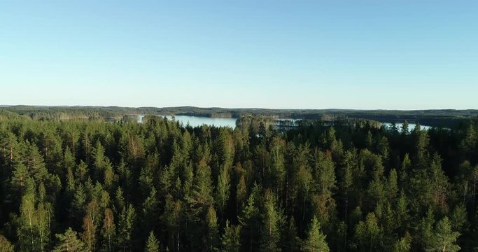 Aerial view of the hills and the blue lake. Beautiful sunset with blue sky. Best place in, tourism and nature concept.