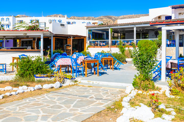 Traditional Greek taverna restaurant on coast of Karpathos island in Ammopi village, Greece