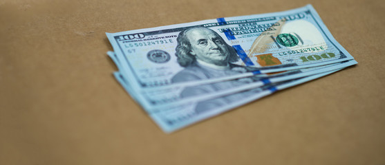 Close-up banknotes Cash Money 100 American Dollars See details of US dollar on paper.