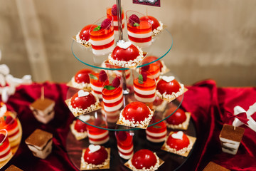 three-story stand with desserts. wedding. close up