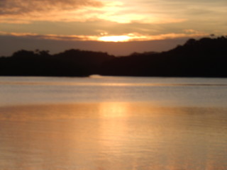 sunset over lake river