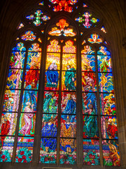 Beautiful stained glass windows in the cathedral of St Vitus in prague Castle in the city of pague in th eCzech Republic