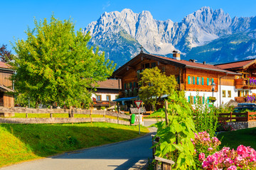Obraz premium Traditional alpine houses in village of Going am Wilden Kaiser on beautiful sunny summer day, Tirol, Austria