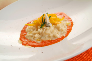 Italian food recipes, risotto with peppers and gorgonzola cheese.