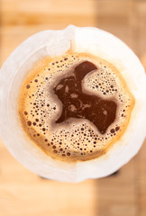 Obraz na płótnie Canvas Hot black coffee in Chemex style.. Barista works in a cafe. Coffee house. Making fantastic coffee.