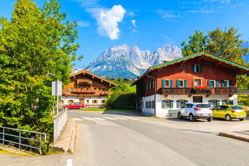 Fototapeta na wymiar Traditional alpine houses in village of Going am Wilden Kaiser on beautiful sunny summer day, Tirol, Austria