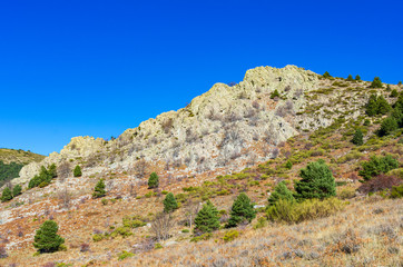 Fototapeta na wymiar Landscape of a rocky mountain and deep blue sky