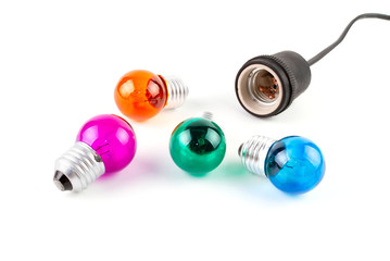 Group of Multiple color Incandescent round light bulb and ceramic Lamp Holders covered with black rubber isolated on white background.
