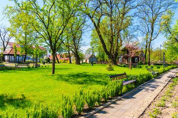 Fototapeta Park in Alwernia village near Krakow city on sunny spring day, Poland obraz