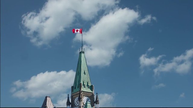 Canadian Parliament on a background of blue sky with white clouds