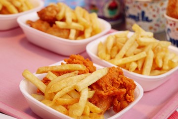 French fries and fried chicken at market