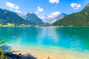 Cystal clear water of Achensee lake near Pertisau town on sunny summer day, Tirol, Austria - obrazy, fototapety, plakaty