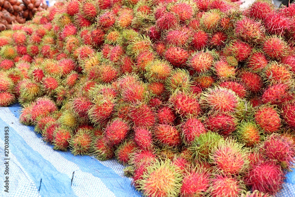 Wall mural rambutan  fruit at street food