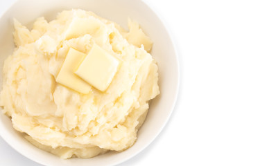 Potatoes with Butter Isolated on a Wooden Table