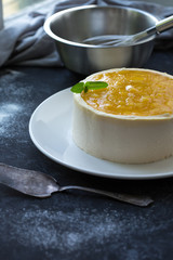 Mango fruit Mousse Cake, decorated with fresh fruits in jelly. Whipped cheese with biscuits