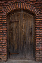 ancient oak wood door in medieval castle