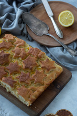 Piece of lemon pie for a breakfast. Piece of lemon pie for a breakfast on a light background