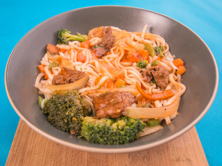 Tenderloin Chow Mein Bowl with Broccoli Carrots and Onions with Soy Sauce