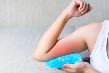 Pain in the arm muscles Will be relieved by cold compresses with cool gel. - obrazy, fototapety, plakaty