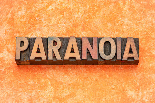 paranoia word abstract in wood type