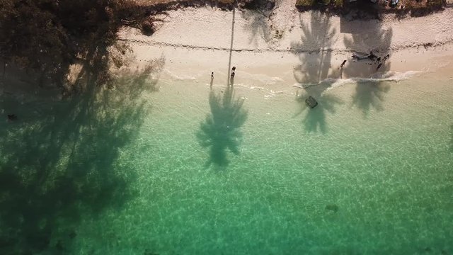 Drone view of beautiful beach. Aerial drone shot of turquoise sea water at the beach