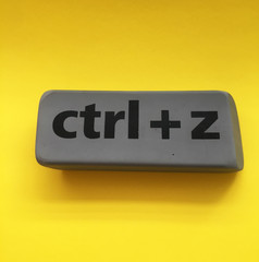 eraser with the inscription "ctrl + z" on a yellow background