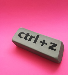 eraser with the inscription "ctrl + z" on a pink background